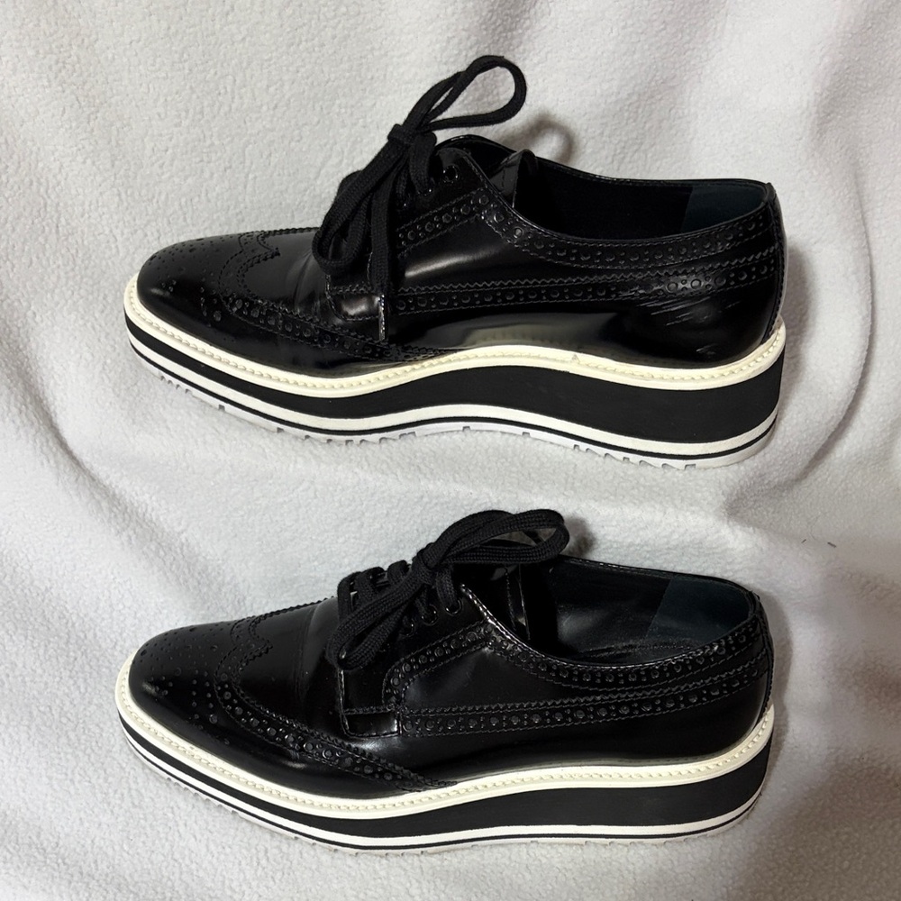 Prada Black and White Sole Brogues